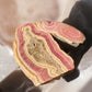 Rhodochrosite raw crystal close view