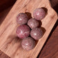 Rhodonite mini crystal spheres on a slab