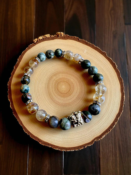 Rhyolite and citrine gemstone bracelet for creativity and abundance.
