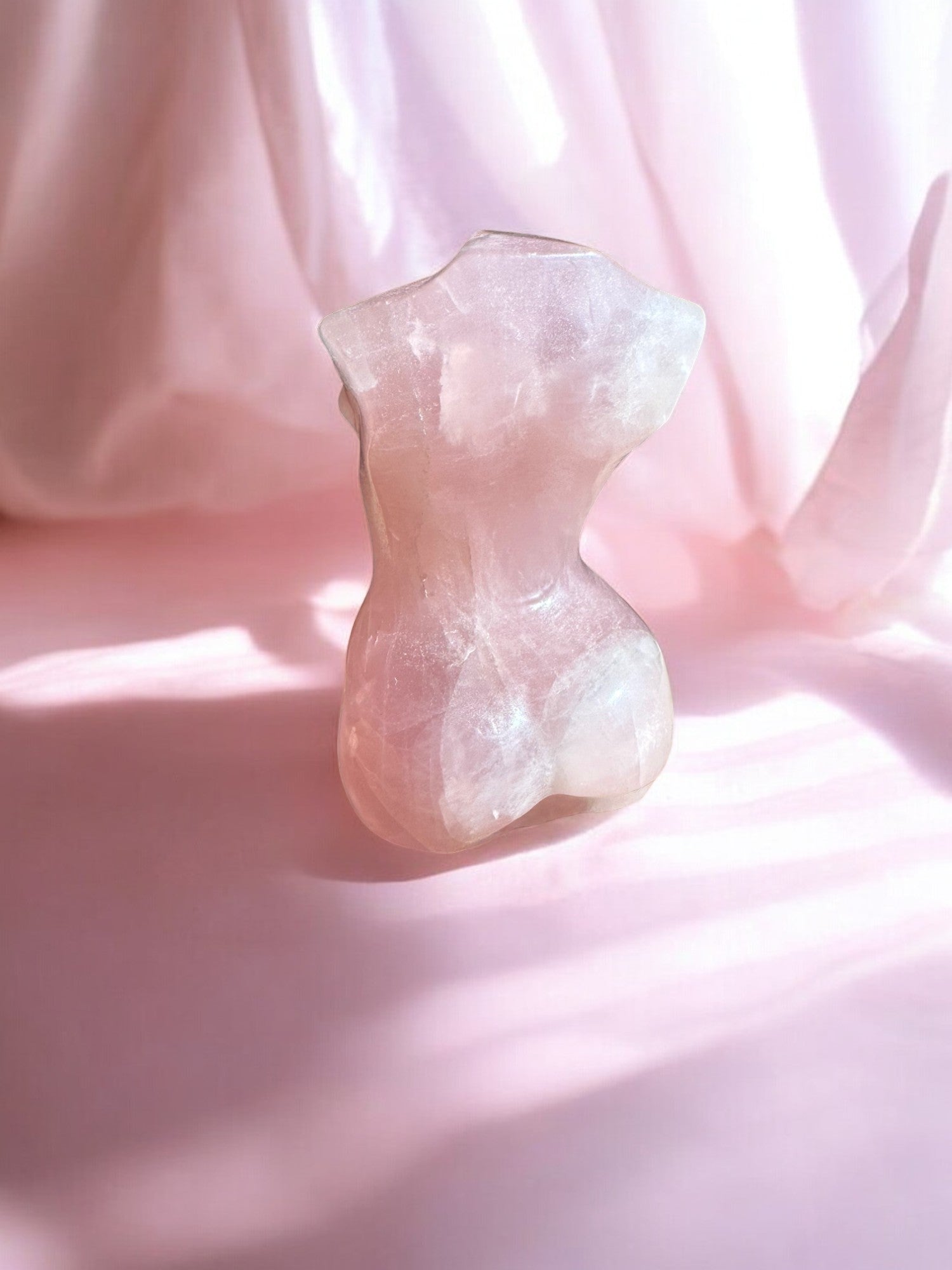Rose quartz goddess crystal figurine