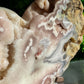 Rough side and crystal formations on crystal heart