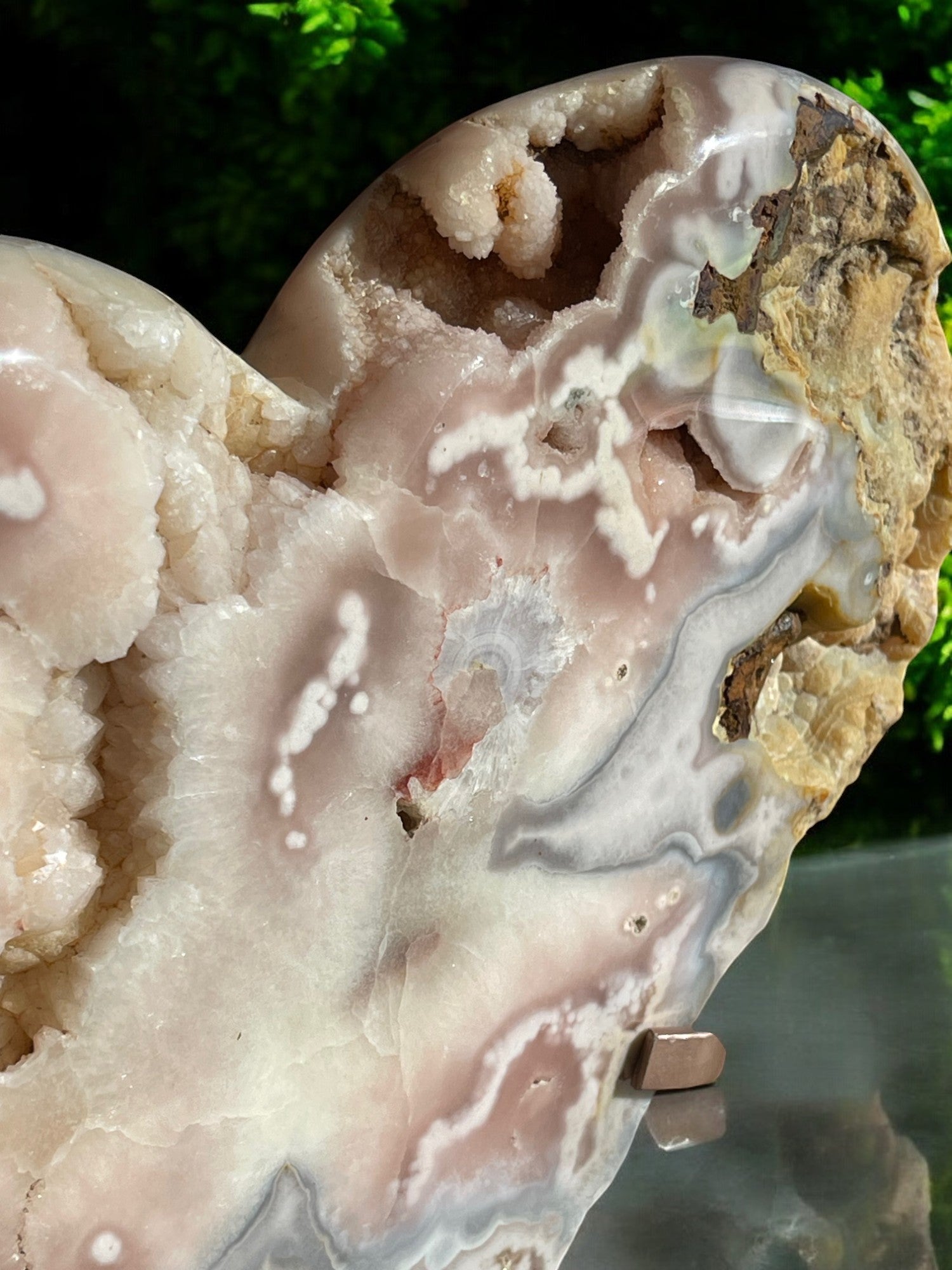 Rough side and crystal formations on crystal heart