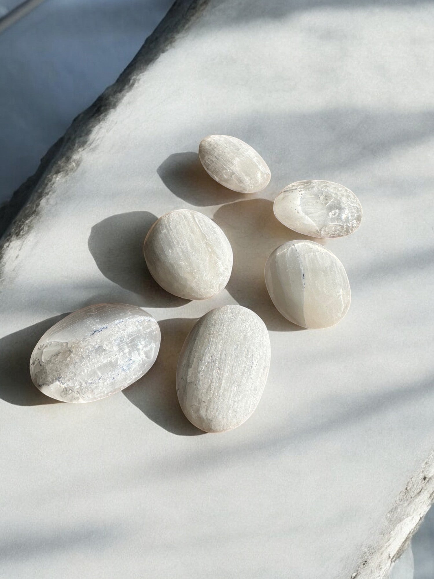 Selenite smaller palm stones