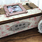 Shabby chic tea organiser box in vintage pink rose design with bronze accents and professional photograph—handmade tea storage chest for tea lovers.