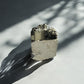 Shiny Pyrite cubes on natural stone matrix
