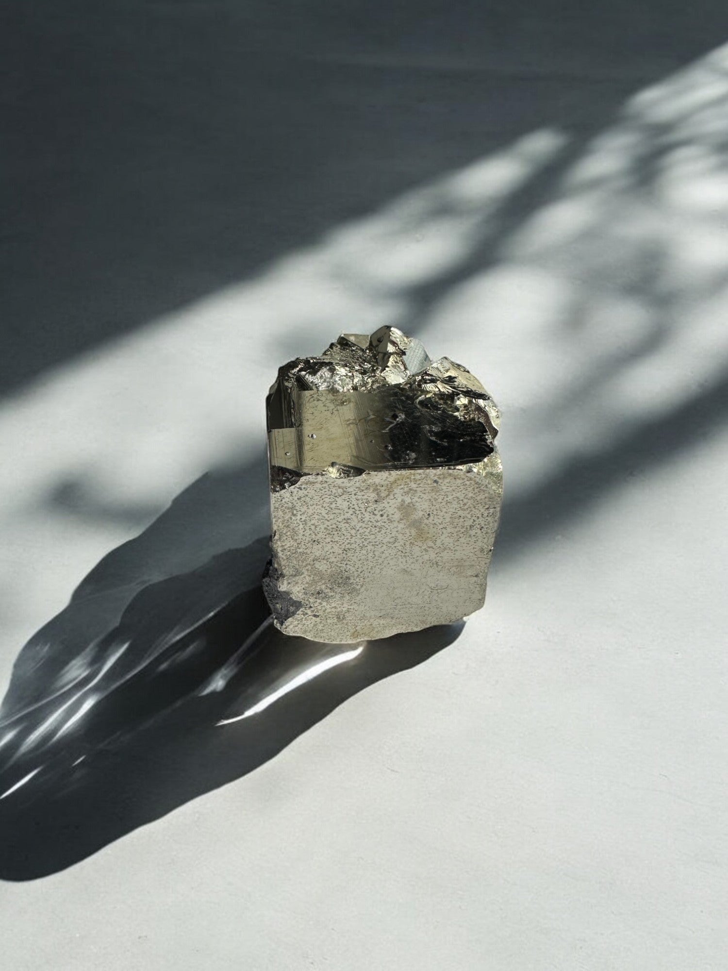 Shiny Pyrite cubes on natural stone matrix