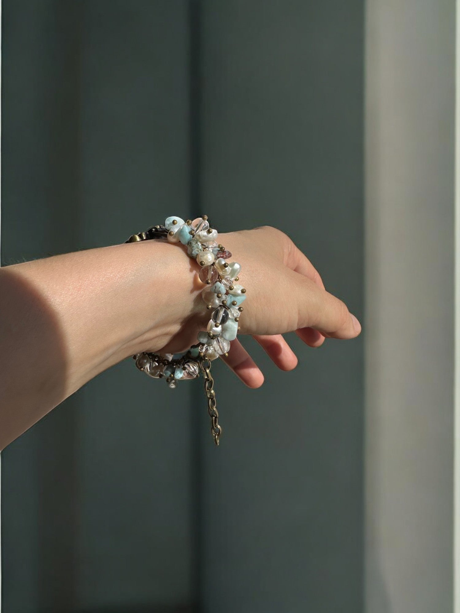 Side view of Larimar, Pearl, and Clear Quartz Custom Watch