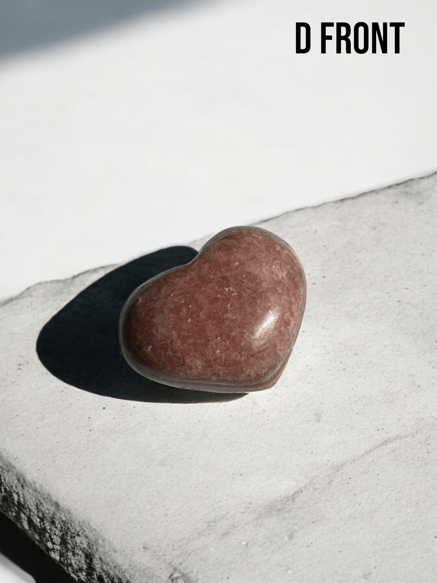 Smooth Rhodochrosite heart with delicate pink shades