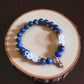 Sodalite and clear quartz gemstone bracelet for truth and clarity.