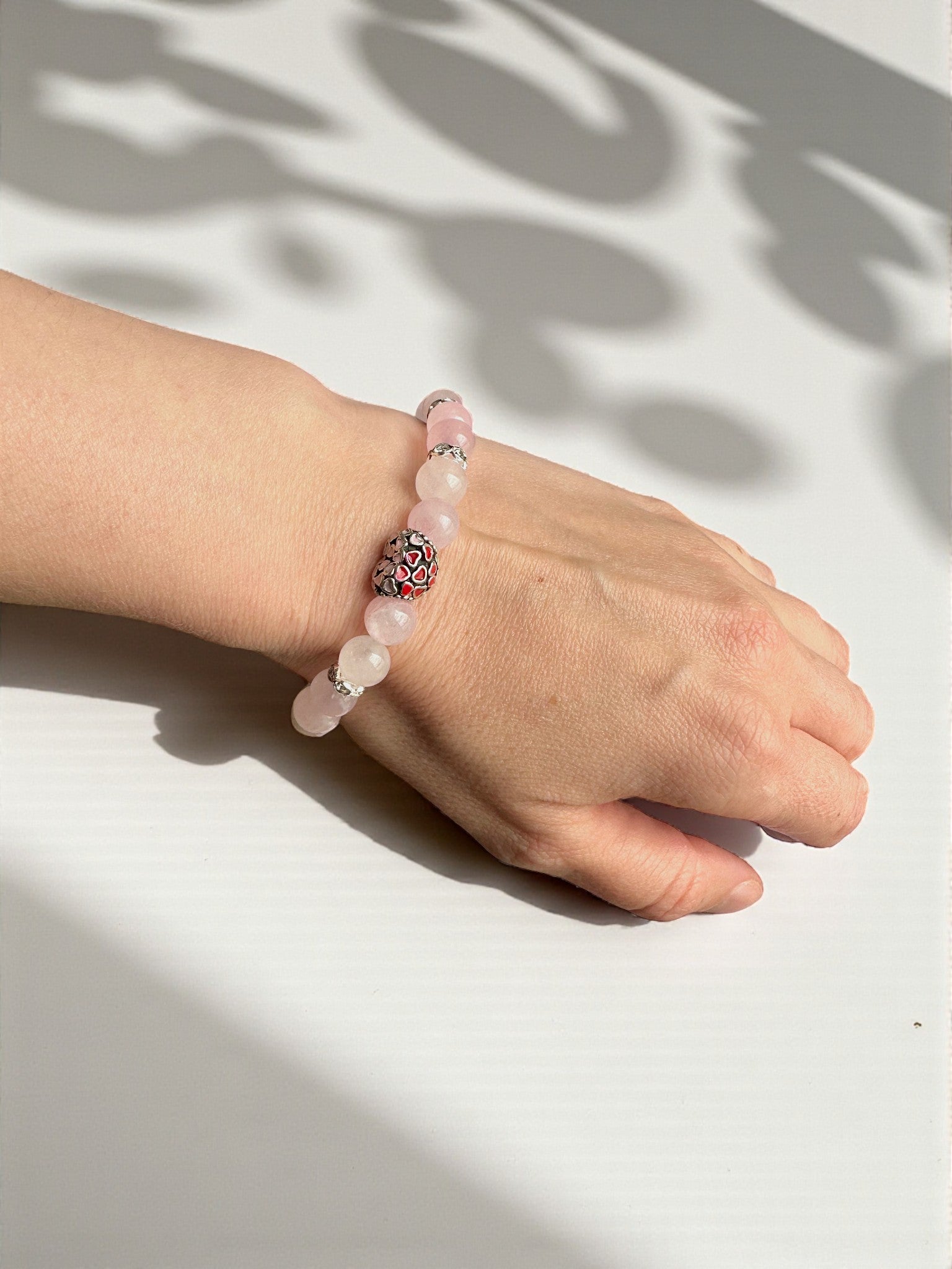 Soft feminine Rose Quartz bracelet symbolising self-love and calm