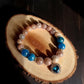 Sunstone and blue apatite bracelet with glowing orange and blue tones