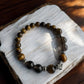 Top view of Tiger's Eye and Smoky Quartz Lion Crystal Bracelet