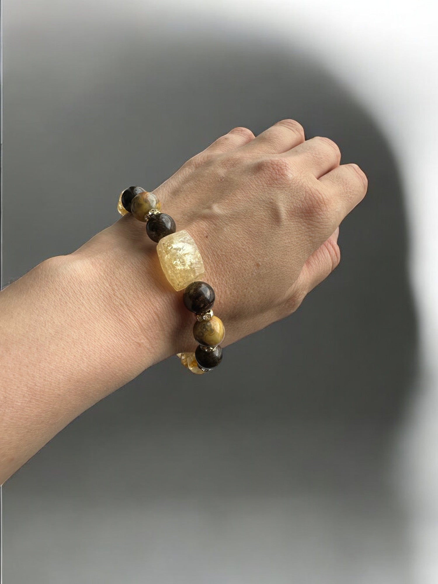 Wearing a Citrine, Bronzite and Crazy Lace Agate Crystal Bracelet