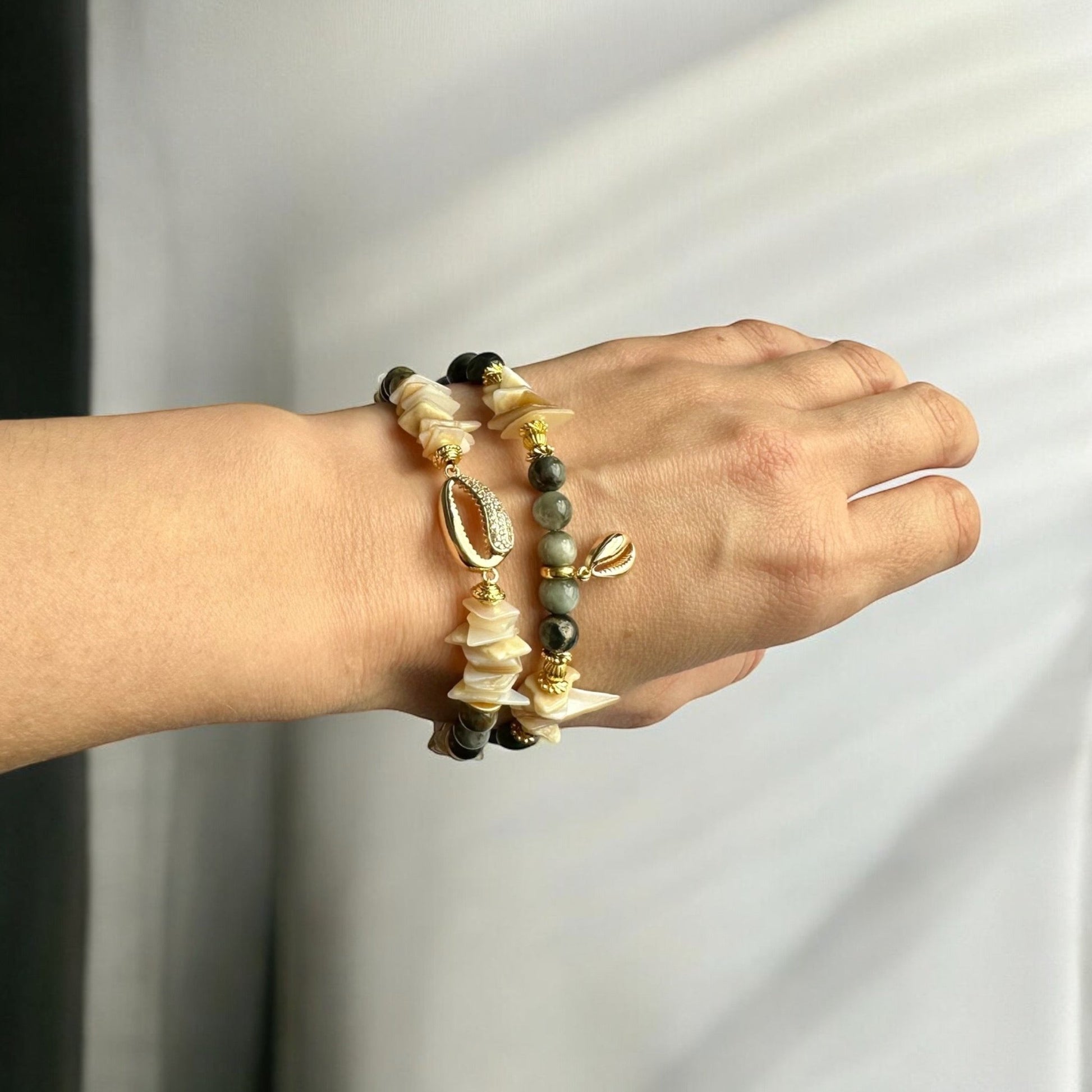 Wearing a Hawk's Eye and Pearl Crystal Bracelet