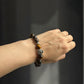 Wearing a Tiger's Eye and Smoky Quartz Lion Crystal Bracelet