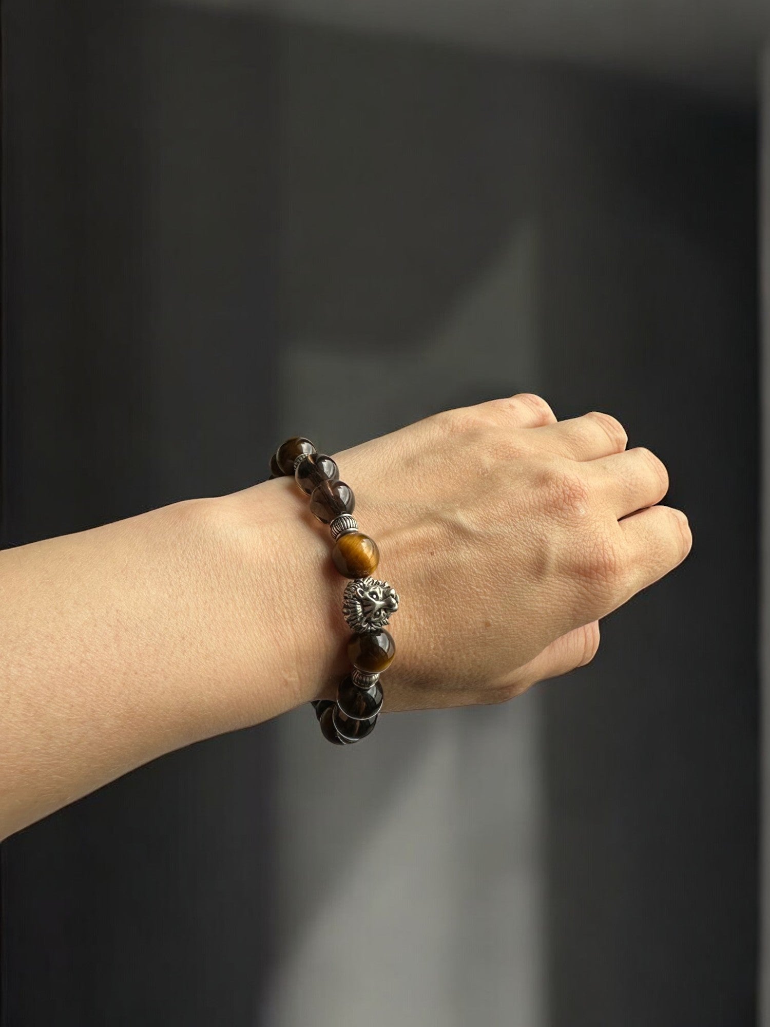 Wearing a Tiger's Eye and Smoky Quartz Lion Crystal Bracelet