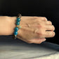 Wearing a blue apatite and bronzite sun crystal bracelet
