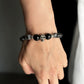 Wearing a protective skull bracelet