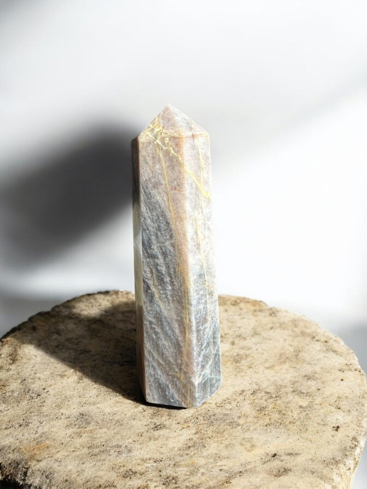 Black moonstone crystal tower with inclusions