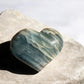 Blue onyx crystal heart on a slab