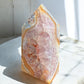 Carnelian crystal tower with amethyst and quartz inclusions