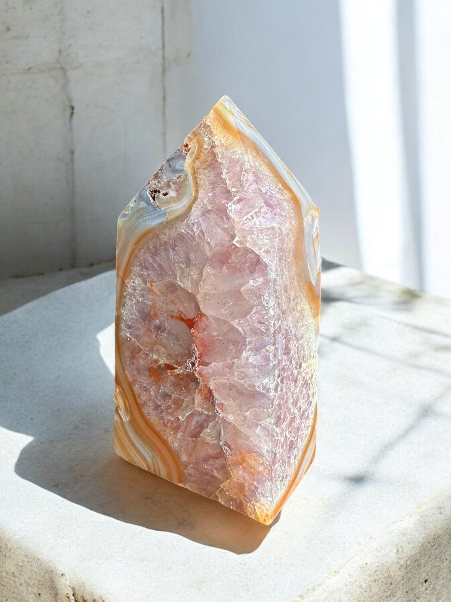 Carnelian crystal tower with amethyst and quartz inclusions