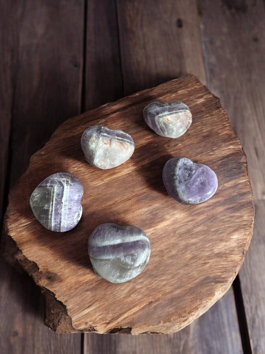 Chevron amethyst crystal hearts on wooden slabs
