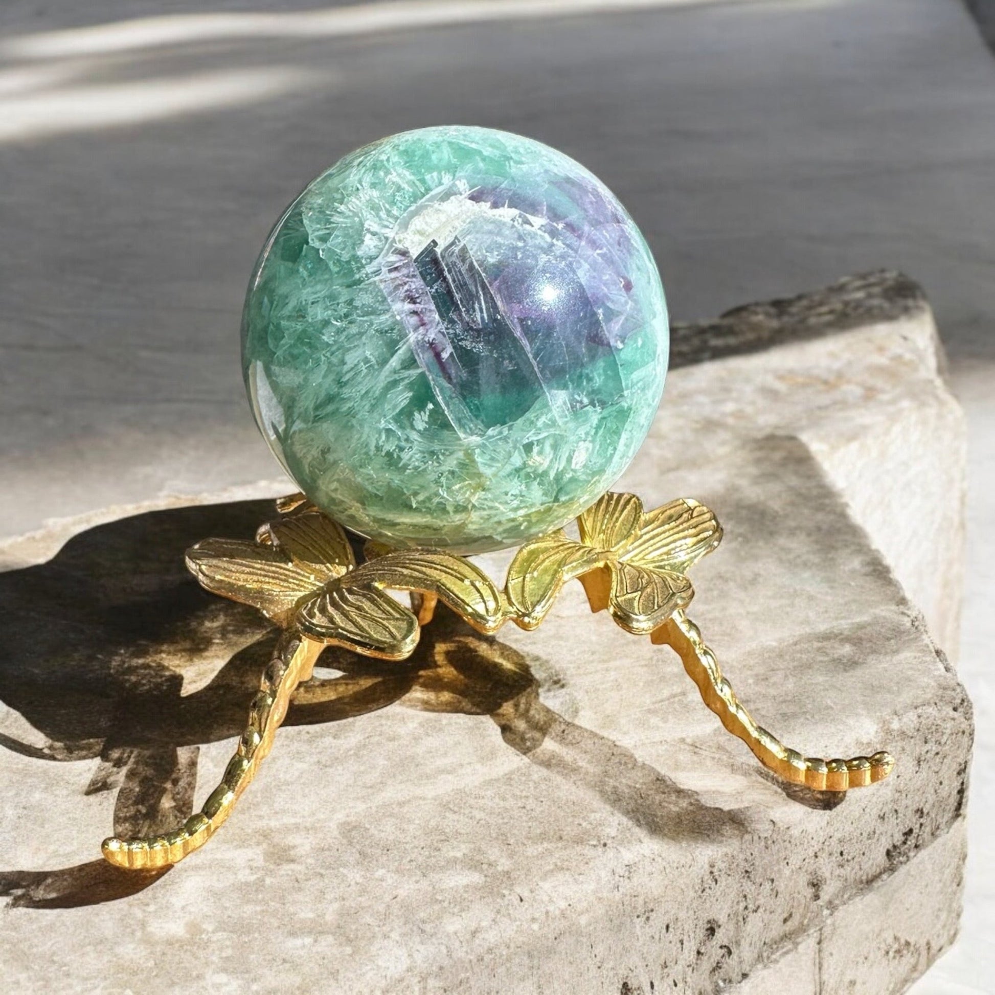 feather fluorite sphere variant 2 front view on a stand