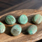 Green moonstone palm stones