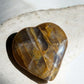 Golden healer quartz crystal heart darker colour