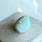 Green moonstone palm stone