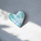larimar stone crystal heart with darker veins