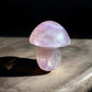 Purple fluorite mushroom crystal figurine on a slab