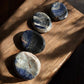 Sodalite worry stones on a slab