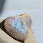 Sun stone in moonstone crystal heart with blue flash
