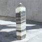 zebra calcite crystal tower on concrete option z14