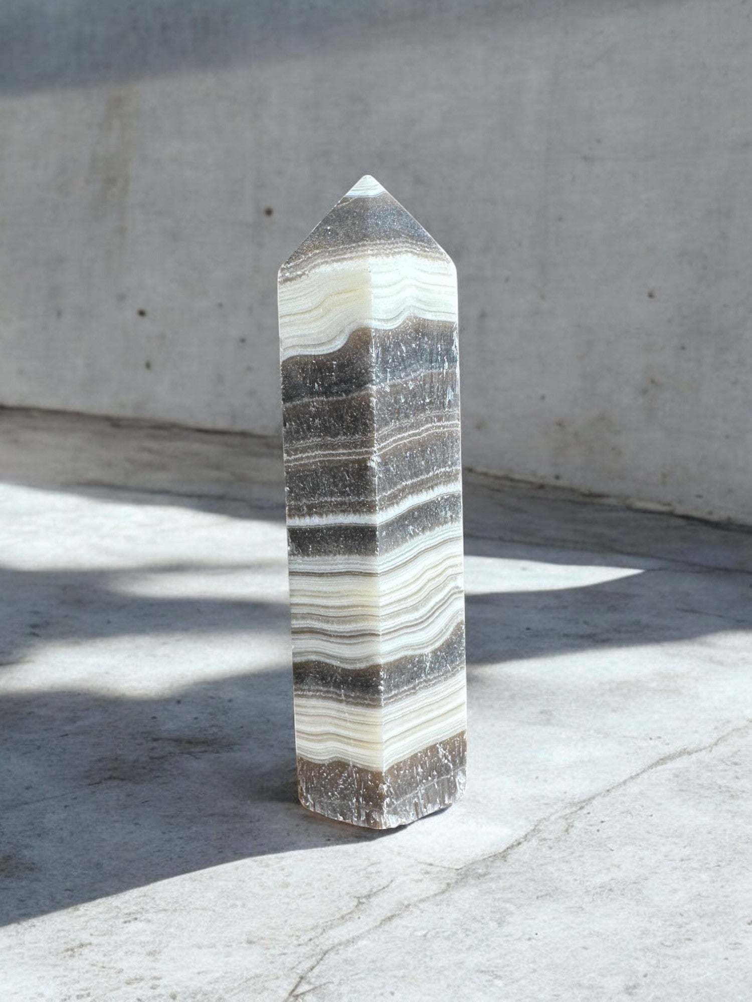 zebra calcite crystal tower on concrete option z14