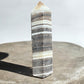 zebra calcite crystal tower on concrete option z15