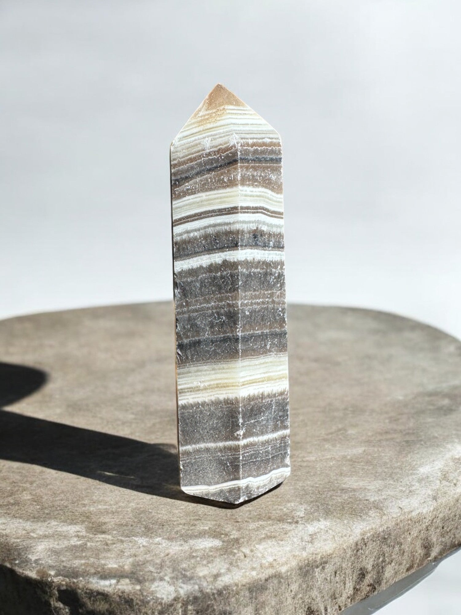 zebra calcite crystal tower on concrete option z15